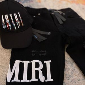 Amiri jeans and hat